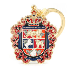 Load image into Gallery viewer, ANNUAL CREST AMULET KEYCHAIN